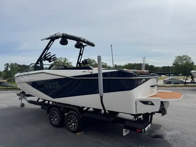 Slide: The Image of 2023 Axis Wake Research T250 boat on trailer, side view. - 11