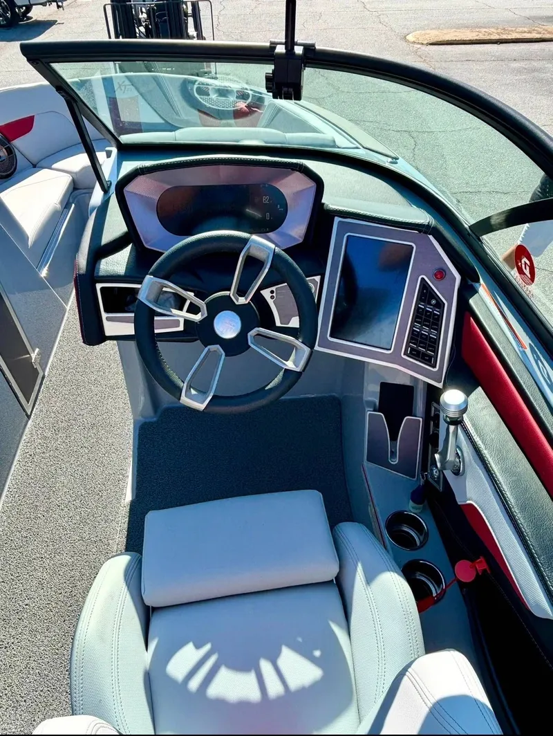 Slide: The Image of Interior view of 2022 MasterCraft XT23 boat cockpit. - 11