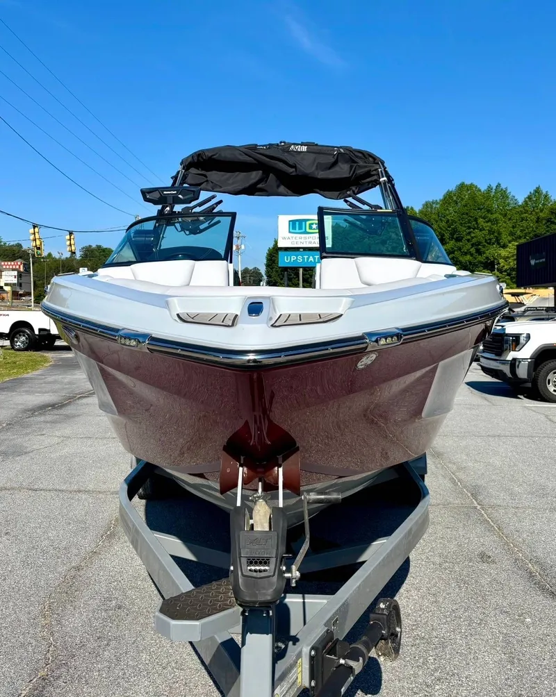 Slide: The Image of 2022 MasterCraft XT23 boat on trailer, front view. - 6