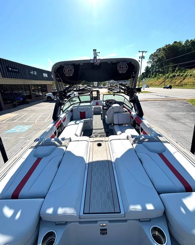 Slide: The Image of Interior view of a 2022 MasterCraft XT23 boat with luxurious seating. - 7