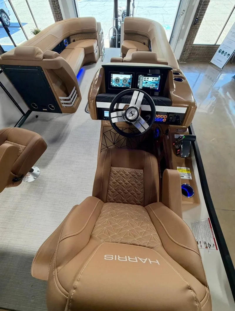 Slide: The Image of Interior of 2026 Harris Grand Mariner 250 with luxurious cockpit. - 10