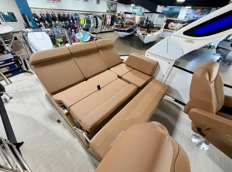 Slide: The Image of Interior of Harris Grand Mariner 250 boat, 2026 model, featuring luxurious seating. - 12