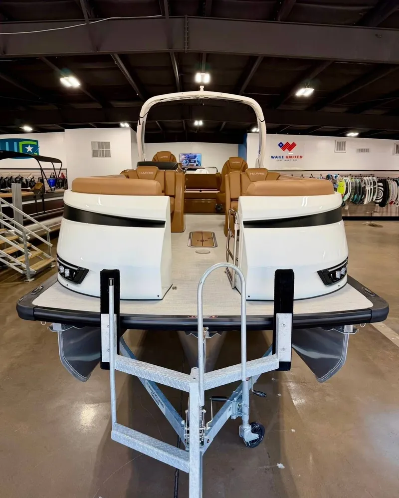 Slide: The Image of 2026 Harris Grand Mariner 250 pontoon boat in showroom. - 15