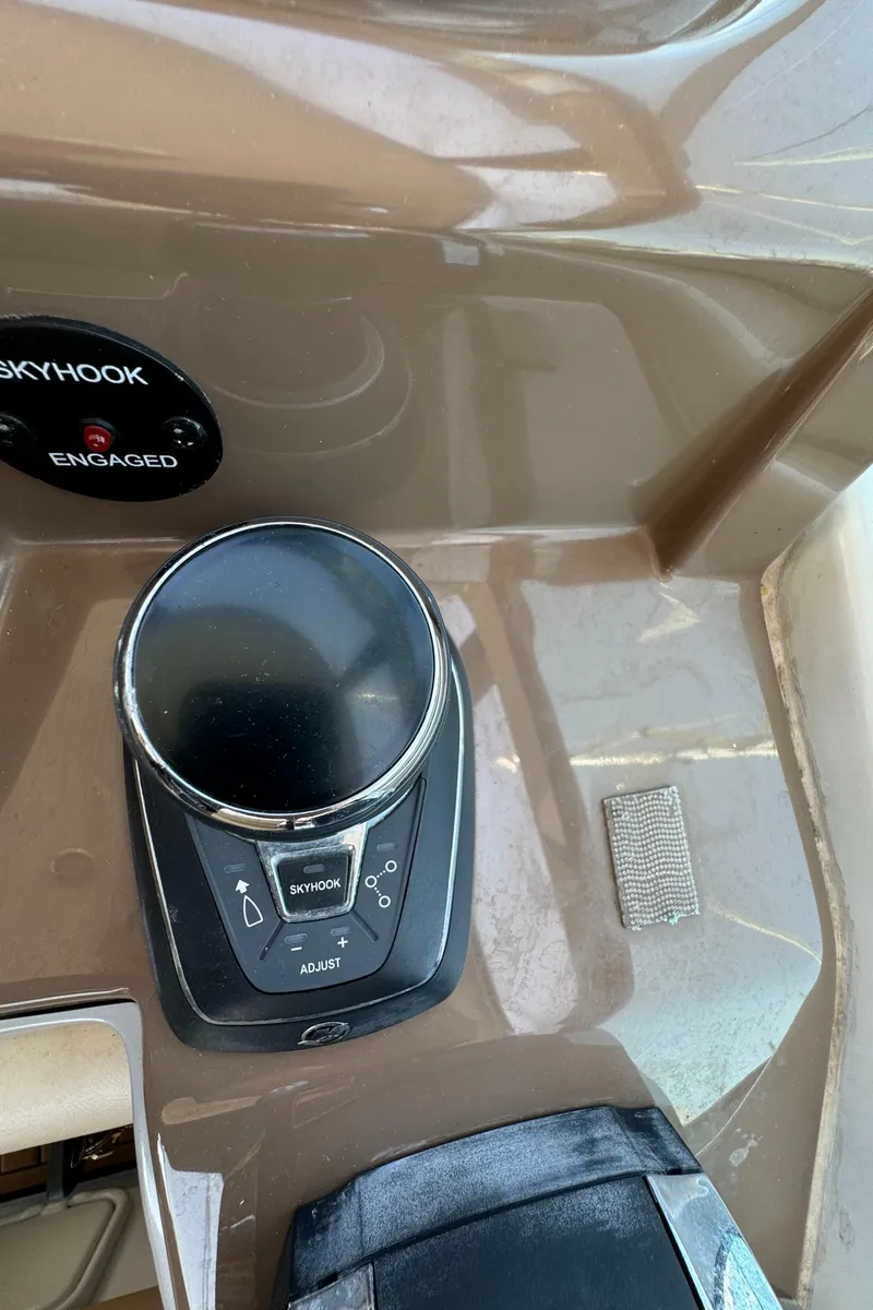Slide: The Image of Control panel of a 2018 Crownline 350 SY boat with Skyhook system engaged. - 30