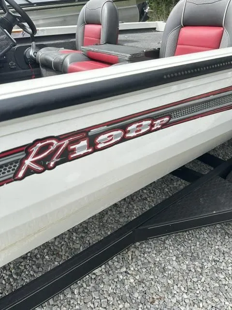 Slide: The Image of 2018 Ranger Tournament RT198P boat with red seats. - 7
