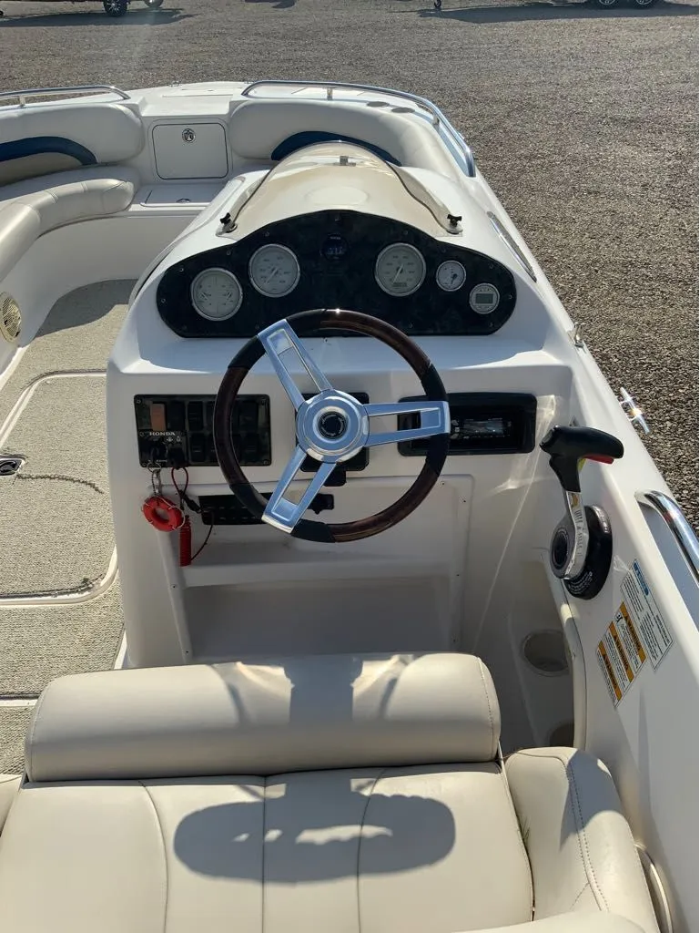 Slide: The Image of Interior view of a 2006 Hurricane GS232 boat cockpit. - 4