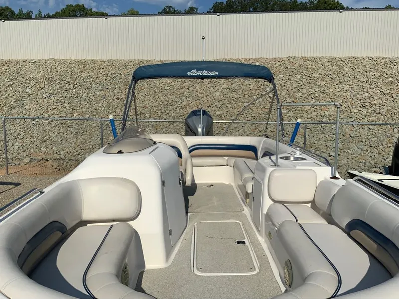 Slide: The Image of 2006 Hurricane GS232 boat with spacious interior and Bimini top. - 6