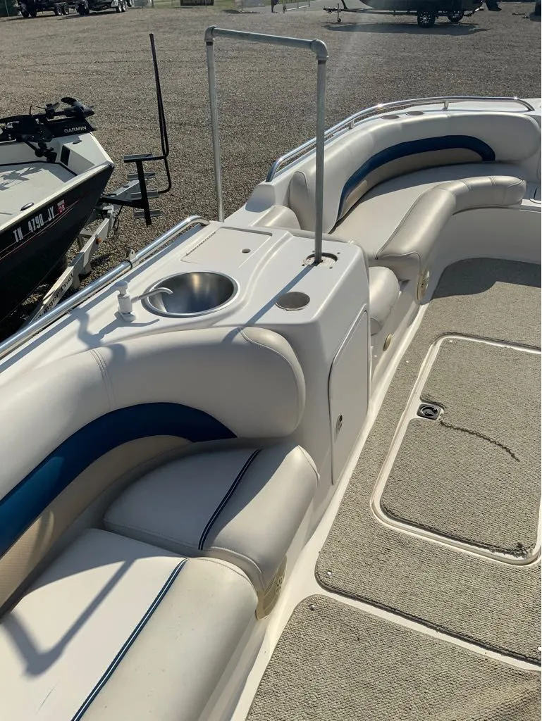 Slide: The Image of Interior of a 2006 Hurricane GS232 boat with seating area. - 7