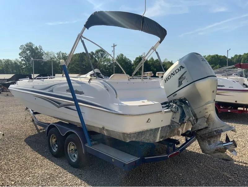 Slide: The Image of 2006 Hurricane GS232 boat with Honda outboard motor on trailer. - 8