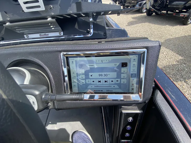 Slide: The Image of 2026 Ranger Z Comanche Z521R boat dashboard with touchscreen display. - 12