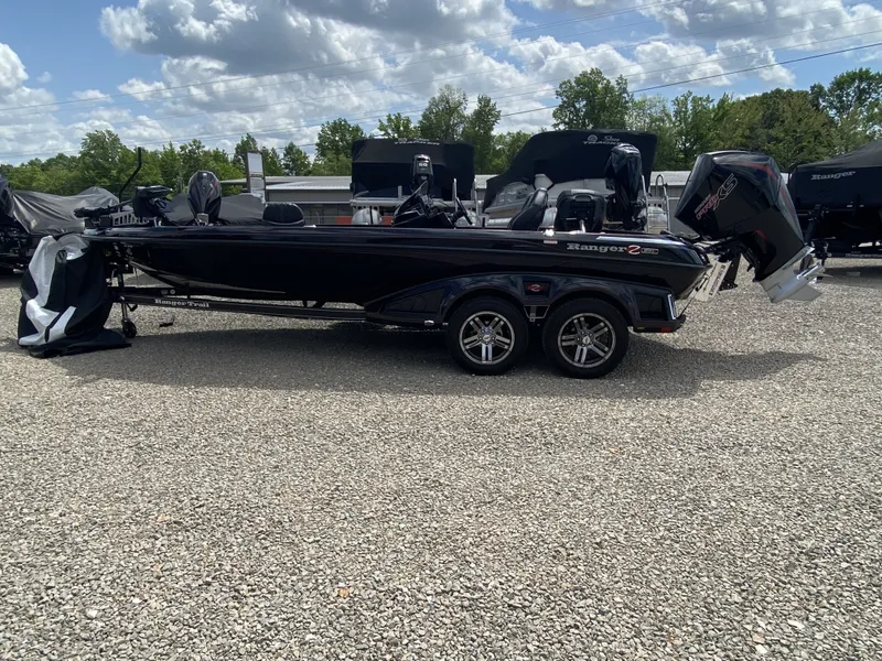 Slide: The Image of 2026 Ranger Z Comanche Z521R boat on gravel lot. - 16