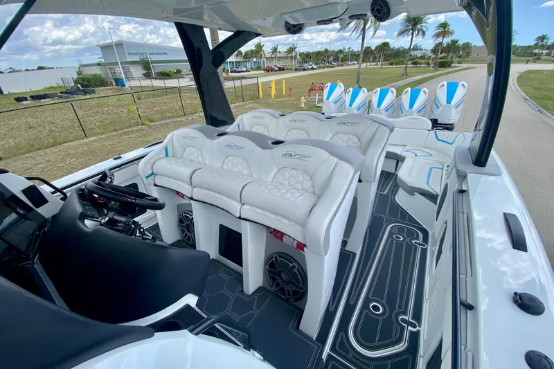 Slide: The Image of Luxurious 2024 MTI V50 boat interior with plush seating and modern design elements. - 17