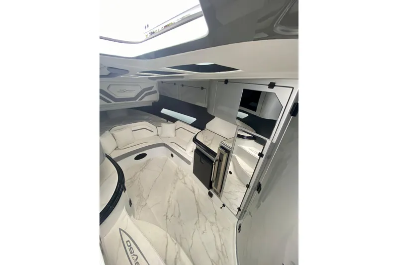 Slide: The Image of Luxurious interior of 2024 MTI V50 boat with modern seating and sleek design. - 20