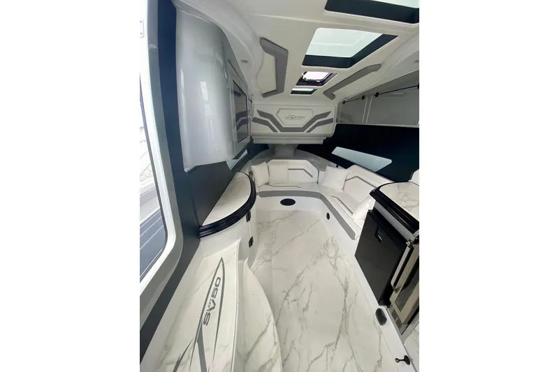Slide: The Image of Luxurious interior of 2024 MTI V50 boat with sleek design and modern amenities. - 21