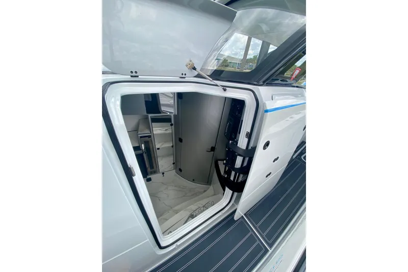 Slide: The Image of Luxurious interior of 2024 MTI V50 boat with modern design and sleek finishes. - 24