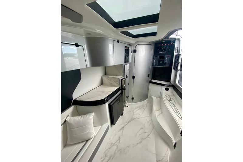 Slide: The Image of Engine compartment of 2024 MTI V50 featuring Seakeeper 3 stabilization system. - 29