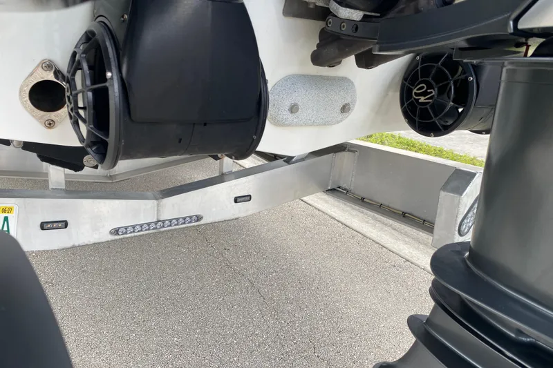 Slide: The Image of 2024 MTI V50 boat trailer detail with black components and LED lights. - 31