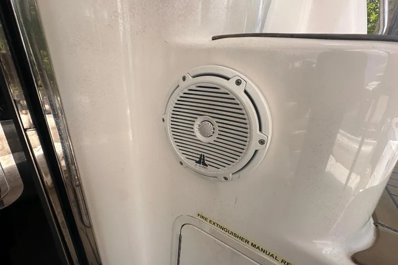 Slide: The Image of Speaker on 2006 Sea Ray 58 Sedan Bridge yacht, mounted on white surface. - 16