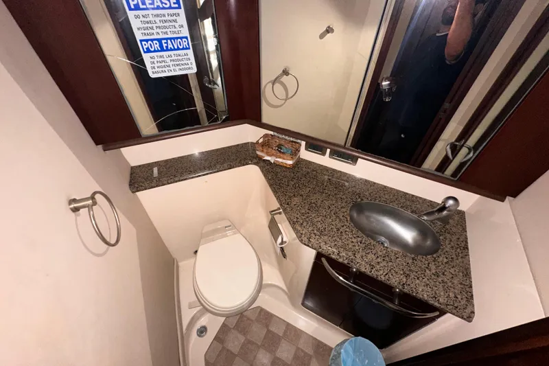 Slide: The Image of Bathroom interior of 2006 Sea Ray 58 Sedan Bridge yacht with granite countertop. - 38