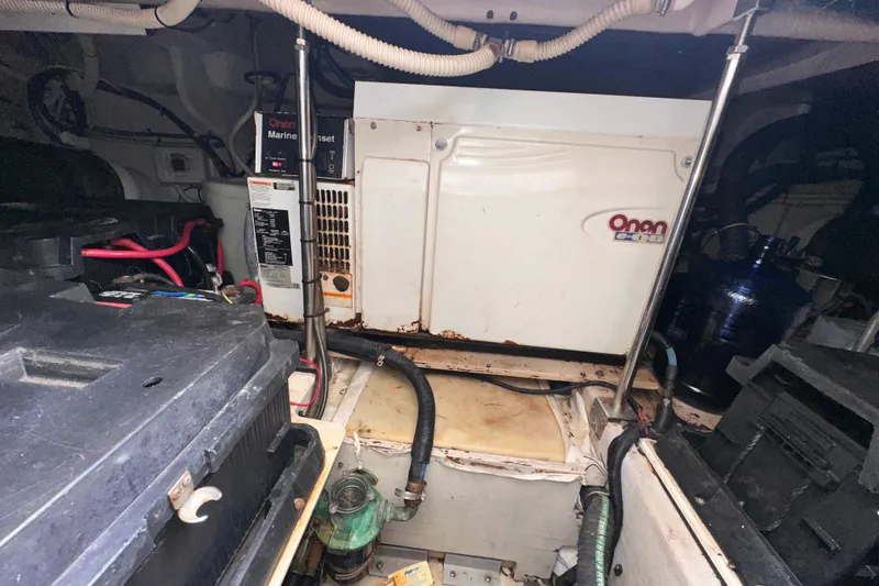 Slide: The Image of Engine room of 2006 Sea Ray 58 Sedan Bridge with Onan marine generator. - 40