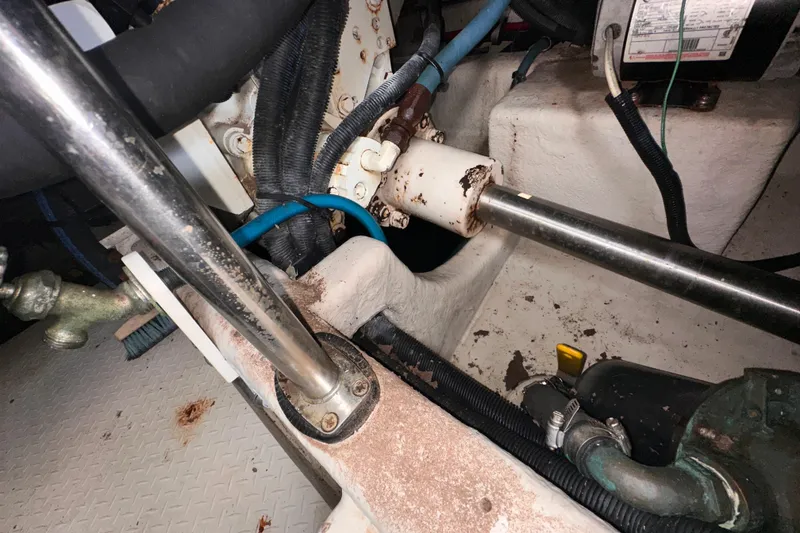 Slide: The Image of Engine room of 2006 Sea Ray 58 Sedan Bridge with visible mechanical components. - 46