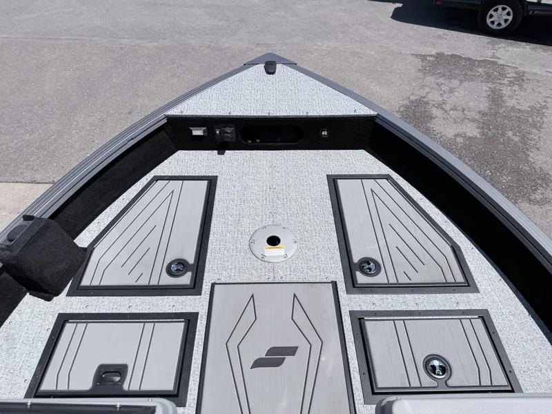 Slide: The Image of Starcraft 188 Delta DC 2026 boat deck with storage compartments. - 27