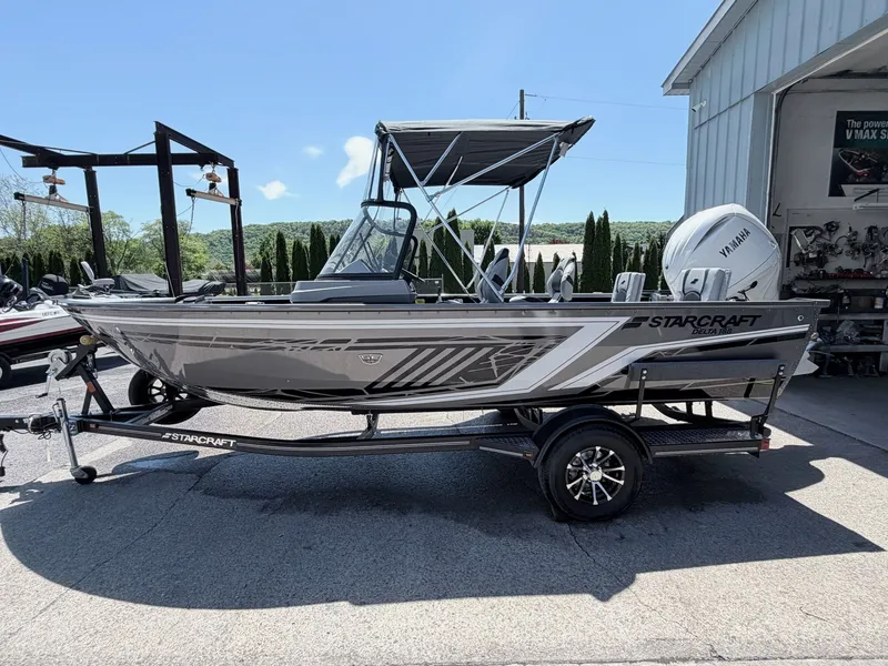 Slide: The Image of 2026 Starcraft 188 Delta DC boat on trailer outdoors. - 31