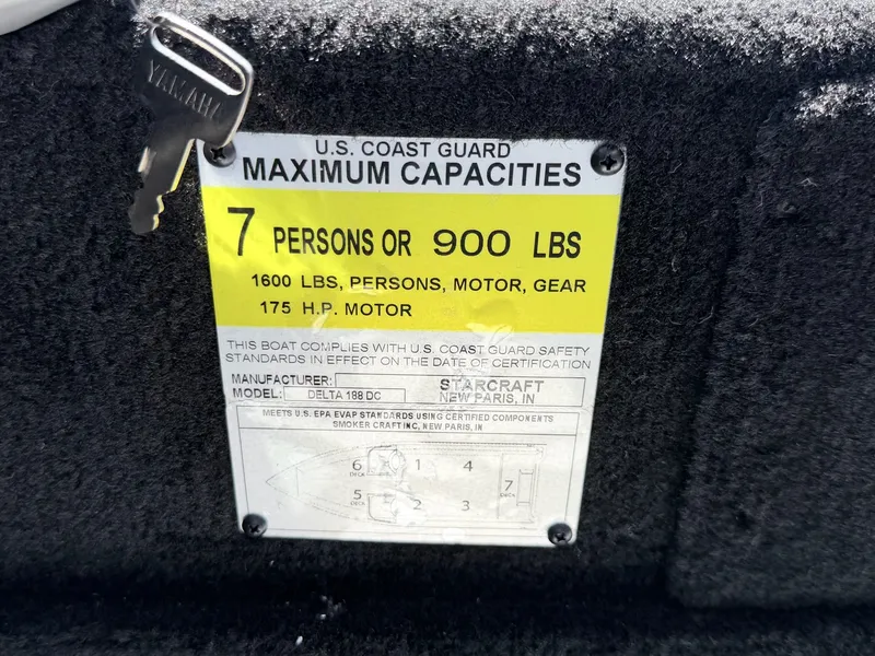 Slide: The Image of Starcraft 188 Delta DC boat capacity label, 7 persons or 900 lbs. - 38