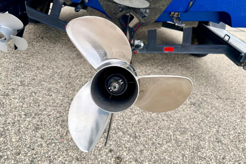 Slide: The Image of Propeller of a 2012 Skeeter SL 185 boat on a trailer, close-up view. - 15