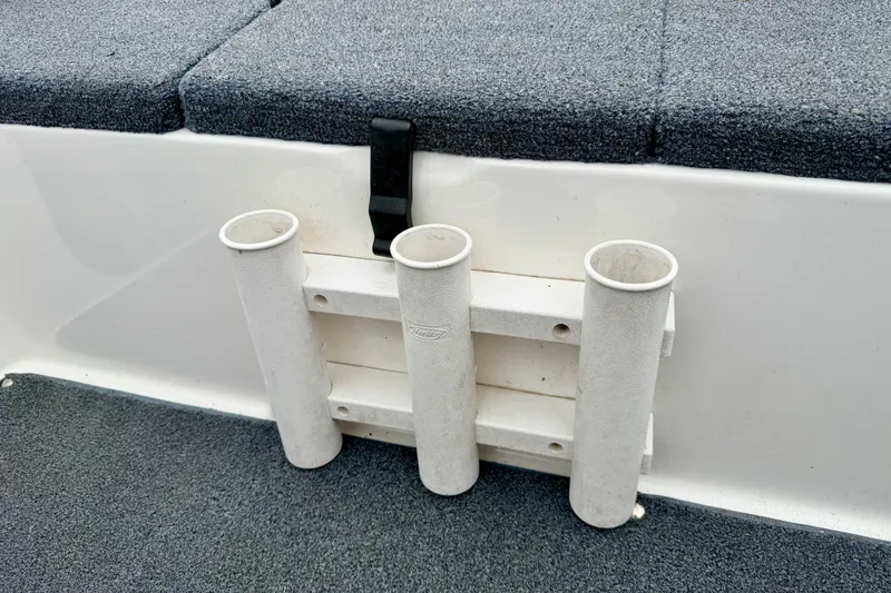 Slide: The Image of Rod holders on a 2012 Skeeter SL 185 boat with carpeted flooring. - 25