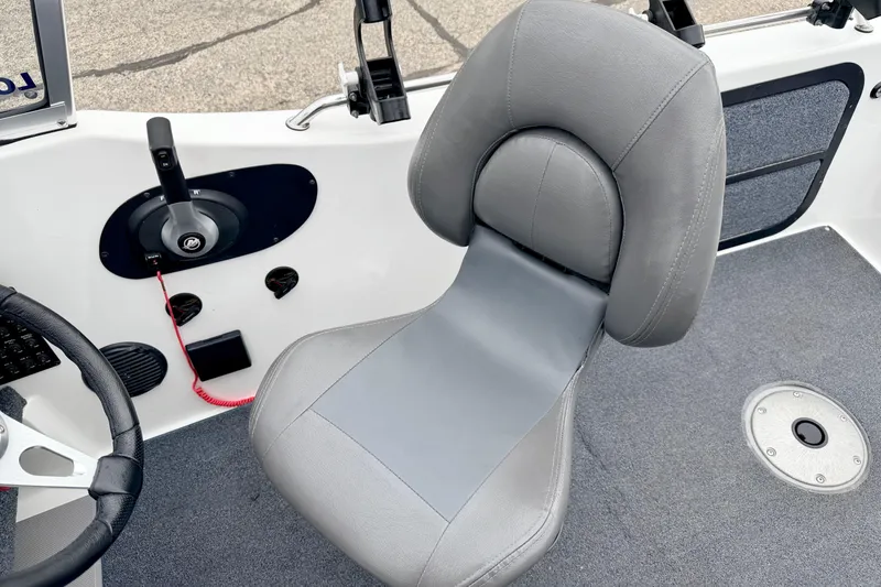 Slide: The Image of 2012 Skeeter SL 185 boat interior with gray seat and control panel. - 36