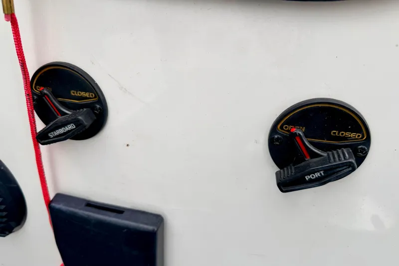 Slide: The Image of Control switches on a 2012 Skeeter SL 185 boat, labeled "Starboard" and "Port." - 43