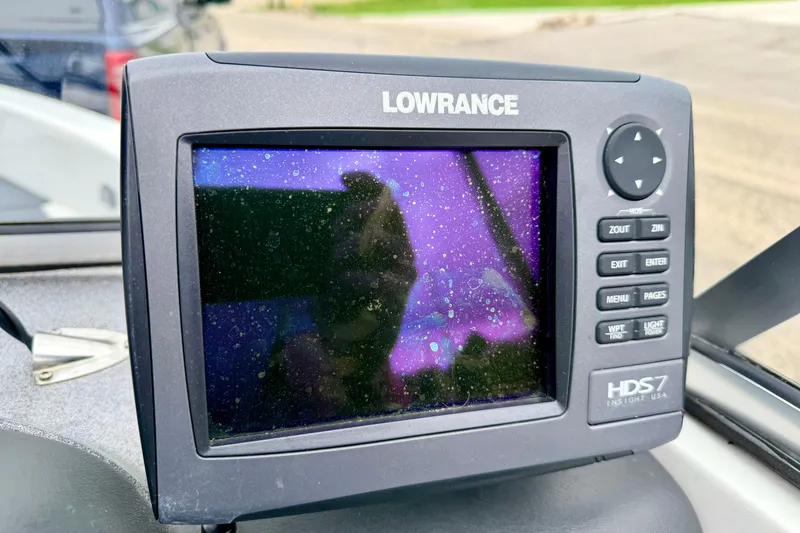 Slide: The Image of Lowrance HDS7 fishfinder on 2012 Skeeter SL 185 boat dashboard. - 46