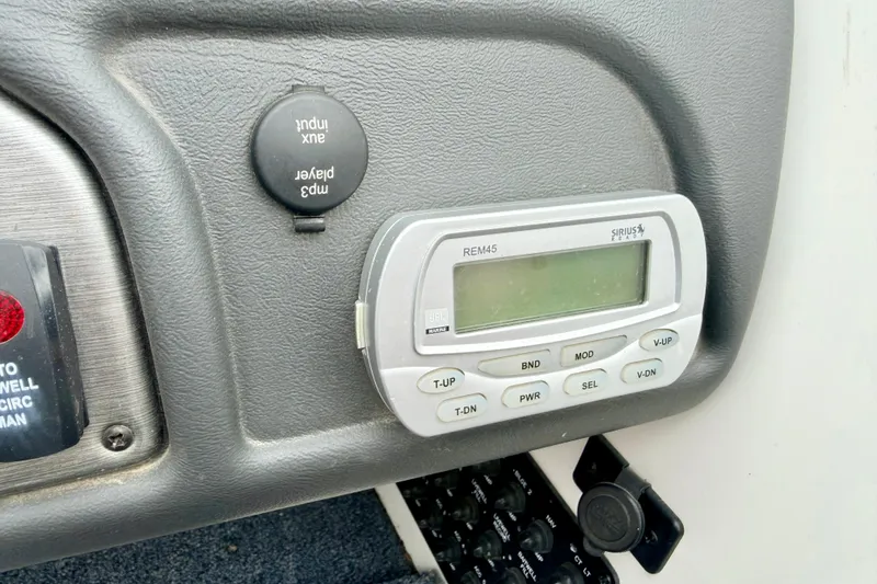 Slide: The Image of 2012 Skeeter SL 185 dashboard with Sirius radio and MP3 input. - 47