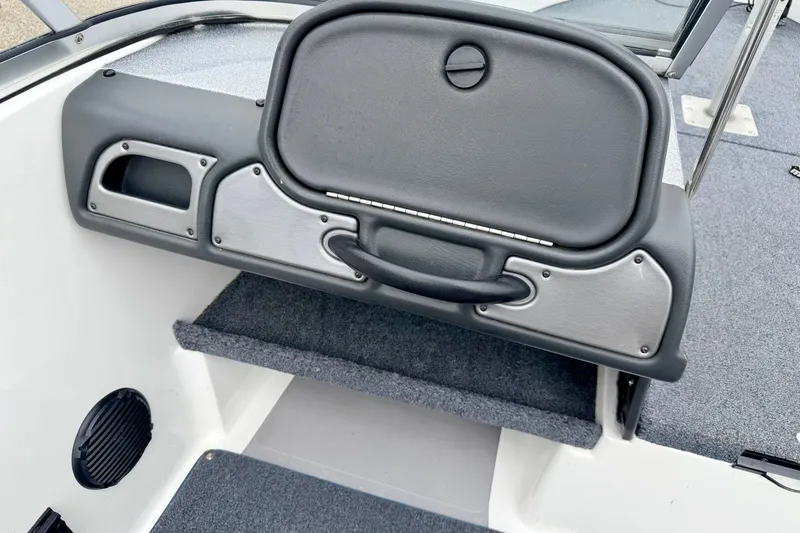 Slide: The Image of Interior view of a 2012 Skeeter SL 185 boat, featuring a storage compartment. - 48