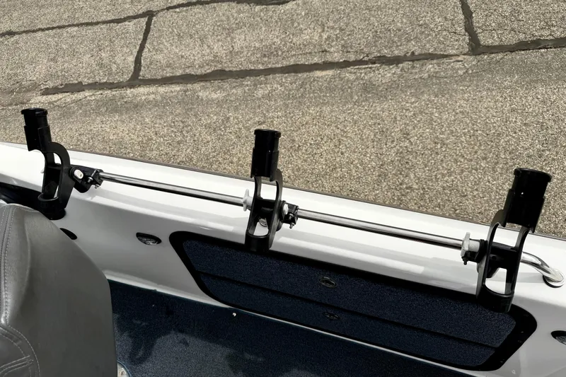 Slide: The Image of 2012 Skeeter SL 185 boat interior with rod holders and seating. - 62