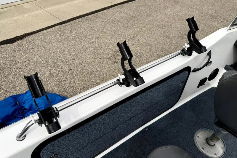 Slide: The Image of 2012 Skeeter SL 185 boat with mounted fishing rod holders on the side. - 63