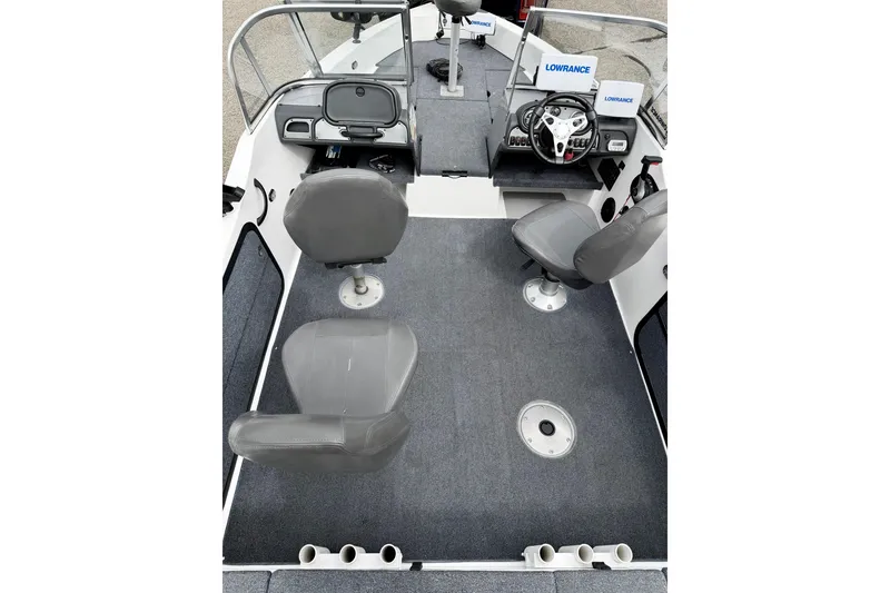 Slide: The Image of 2012 Skeeter SL 185 boat interior with gray seating and Lowrance electronics. - 64