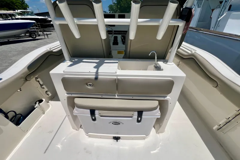 Slide: The Image of 2023 Key West 263 FS boat interior with sink and storage area. - 20