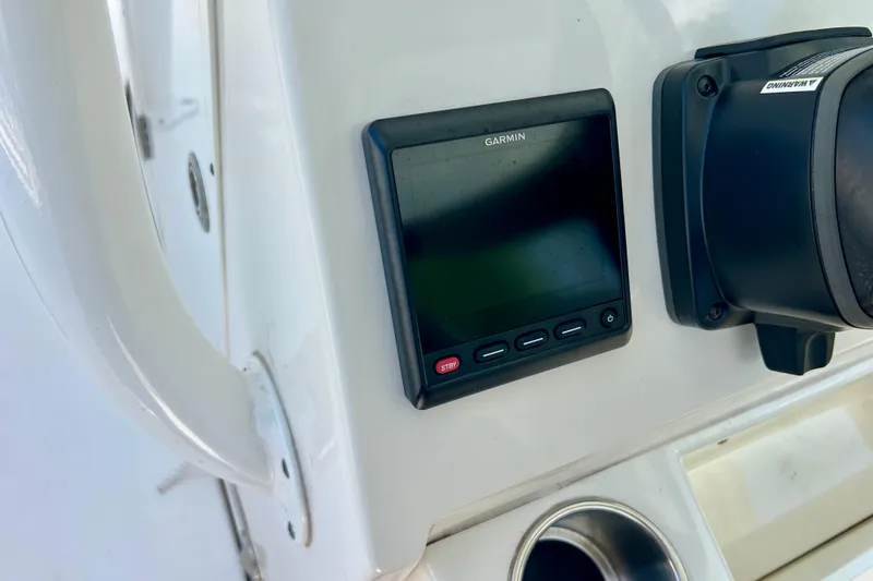 Slide: The Image of Garmin display on 2023 Key West 263 FS boat dashboard. - 27