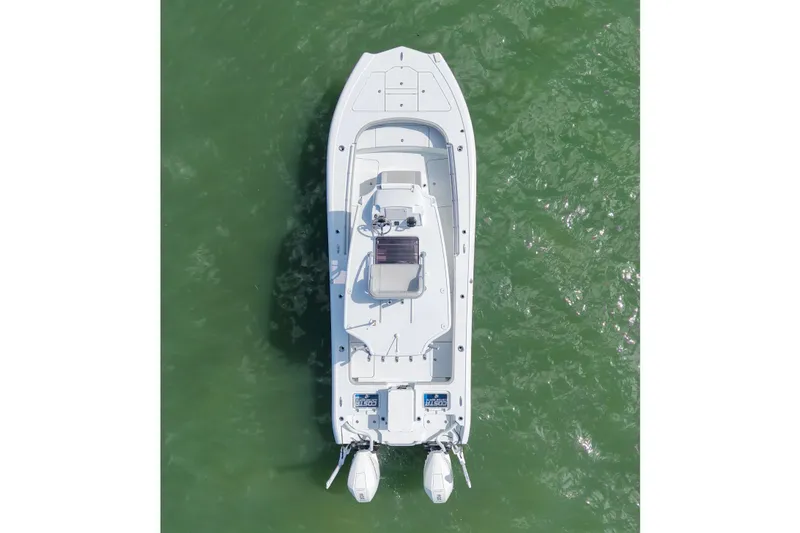 Slide: The Image of Aerial view of 2024 Costa Custom Boats 264HC on green water. - 14