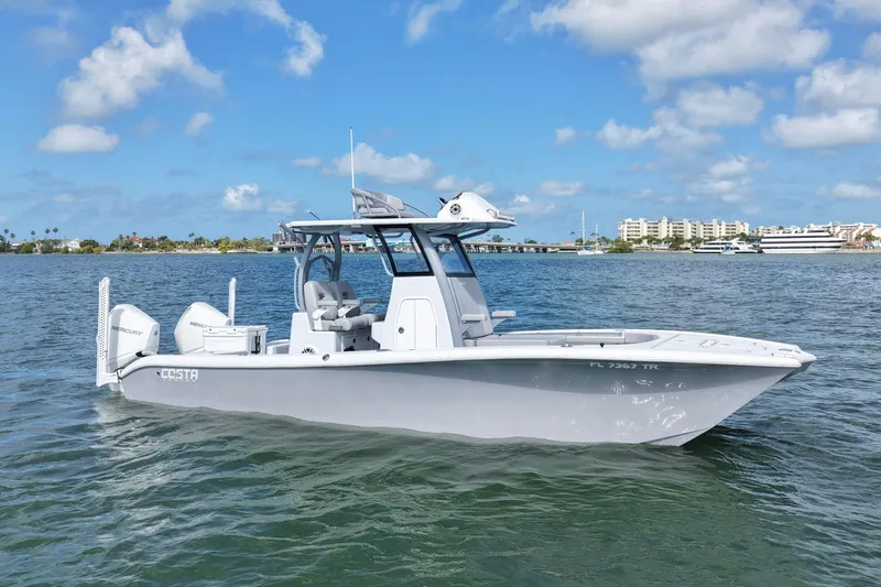 Slide: The Image of 2024 Costa Custom Boats 264HC on water, showcasing sleek design and twin Mercury engines. - 2