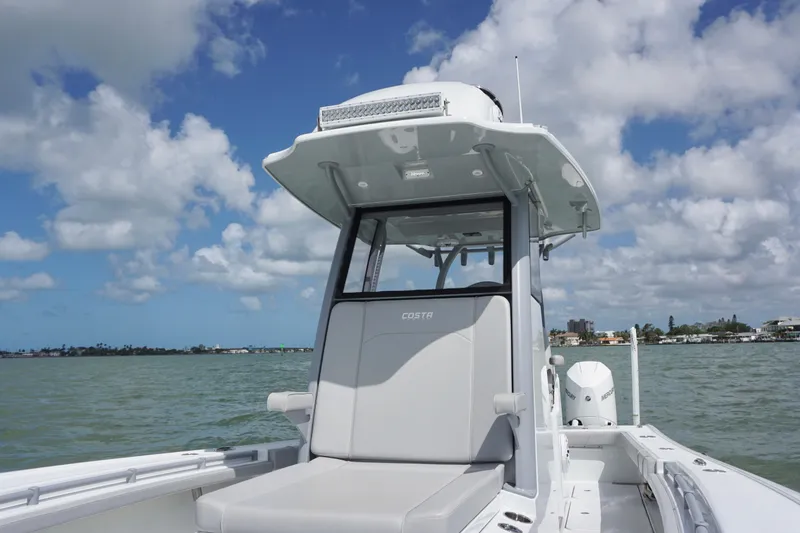 Slide: The Image of 2024 Costa Custom Boats 264HC on water, showcasing sleek design and modern features. - 31