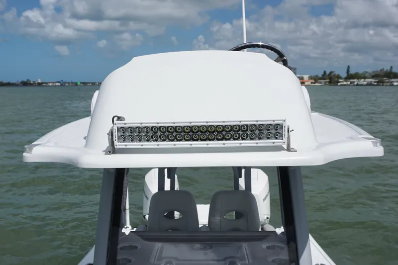 Slide: The Image of 2024 Costa Custom Boats 264HC with LED light bar on open water. - 35