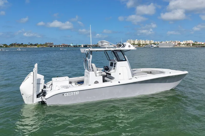 Slide: The Image of 2024 Costa Custom Boats 264HC on calm water, showcasing sleek design and modern features. - 4