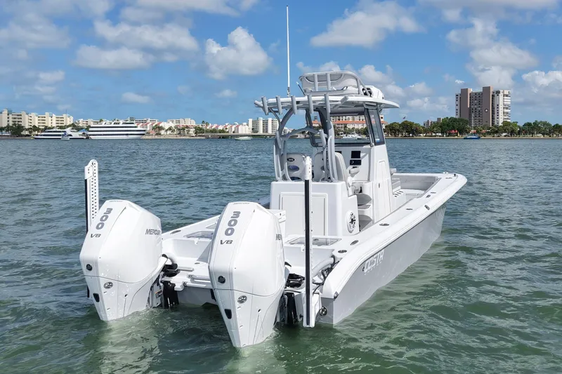 Slide: The Image of 2024 Costa Custom Boats 264HC on water, featuring dual Mercury 300 V8 engines. - 6