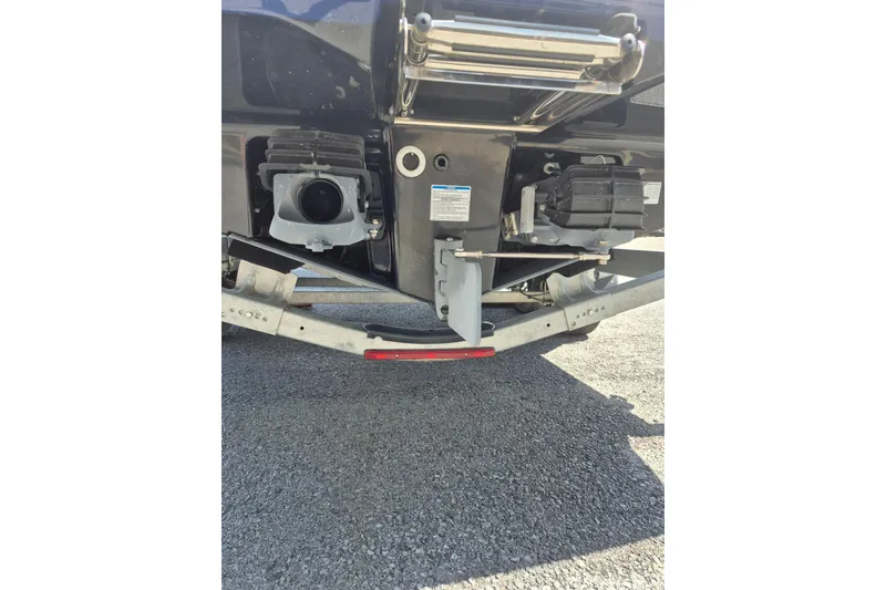 Slide: The Image of Rear view of 2021 Yamaha Boats 252SE jet propulsion system on trailer. - 16