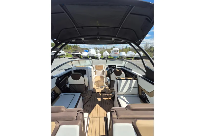 Slide: The Image of 2021 Yamaha Boats 252SE interior with sleek seating and modern design. - 6
