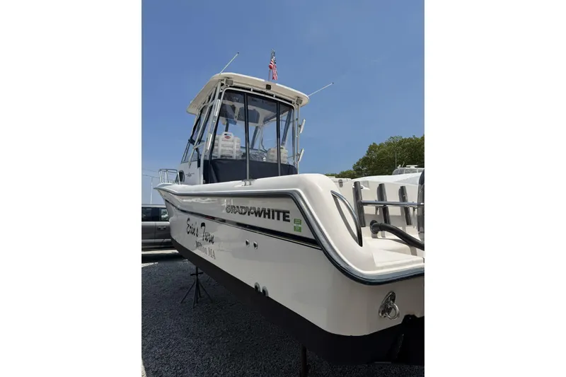 Slide: The Image of 2003 Grady-White Sailfish 282 boat on display, featuring sleek design and sturdy build. - 2