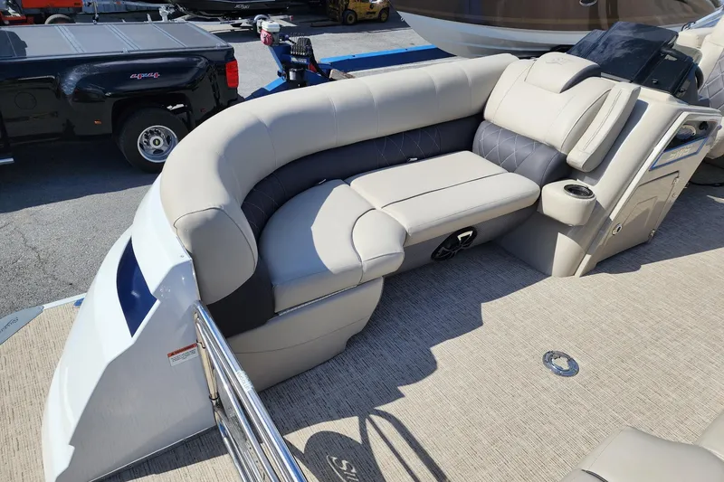 Slide: The Image of Luxurious seating on 2022 Silver Wave 2410 SW5 pontoon boat, featuring plush upholstery. - 14